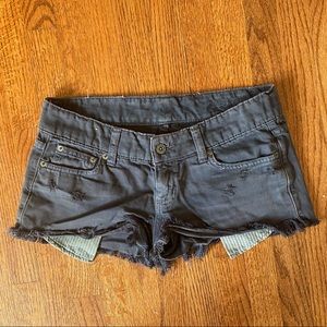 Faded black cut off jean shorts
